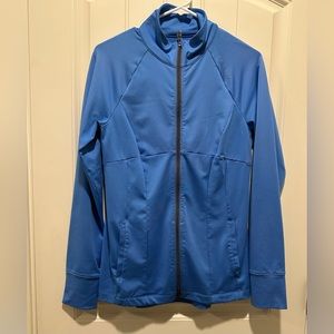 Under Armour women’s blue full zip athletic jacket. Size large.
